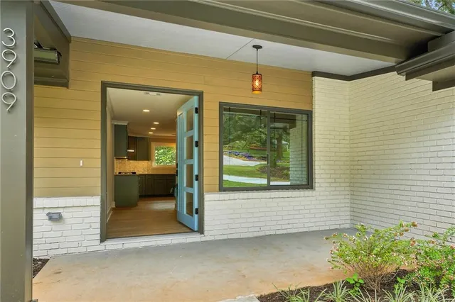 a view of a hallway with a room