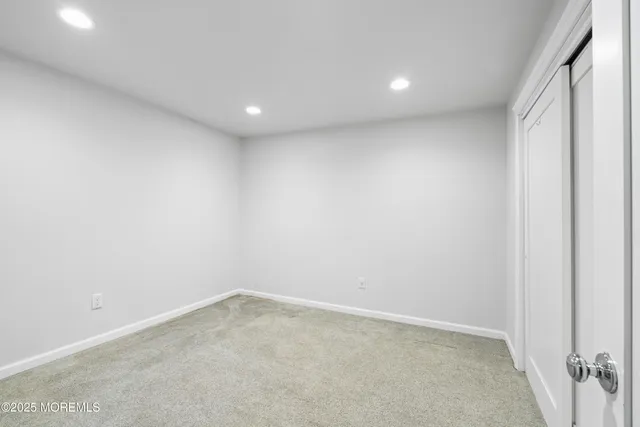 a view of a house with swimming pool and sitting area