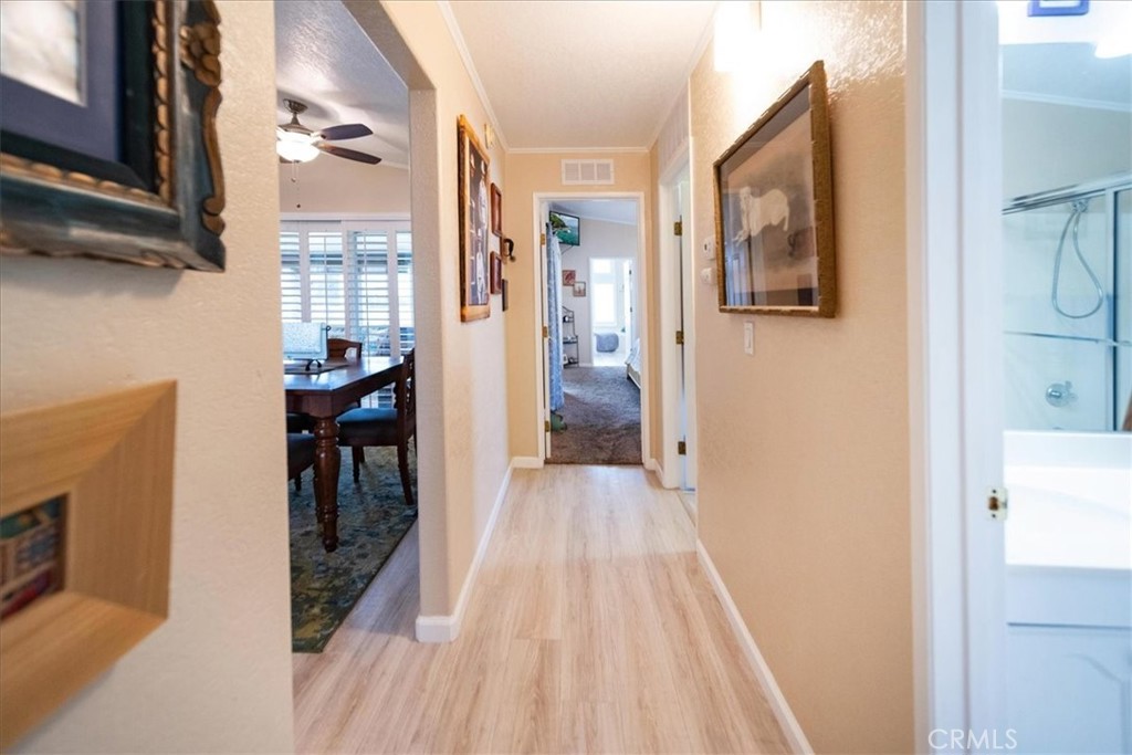 35493 Sand Rock Road Thousand Palms, CA 92276 - Photo 18 of 71 a view of a livingroom with wooden floor and furniture