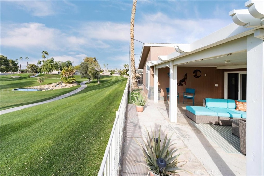 35493 Sand Rock Road Thousand Palms, CA 92276 - Photo 43 of 71 a view of a house with a yard