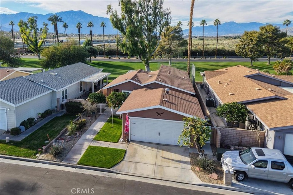 35493 Sand Rock Road Thousand Palms, CA 92276 - Photo 49 of 71 an aerial view of a house with garden space and street view