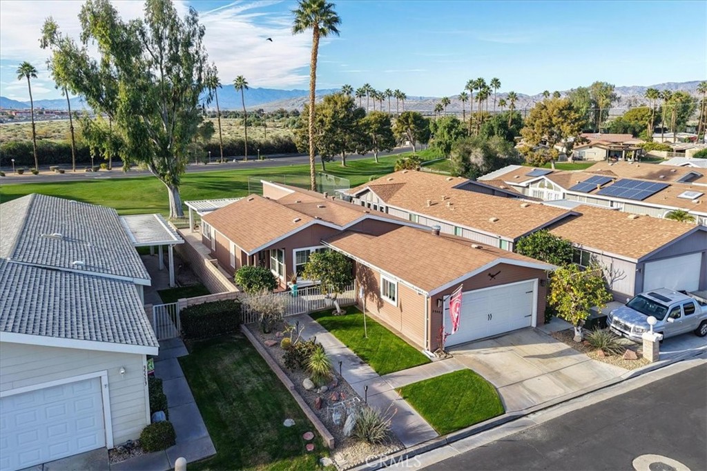 35493 Sand Rock Road Thousand Palms, CA 92276 - Photo 50 of 71 an aerial view of a house with garden space and street view