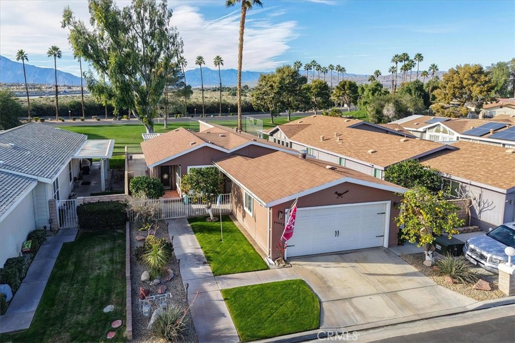 35493 Sand Rock Road Thousand Palms, CA 92276 - Photo 51 of 71 a aerial view of a house with garden space and street view