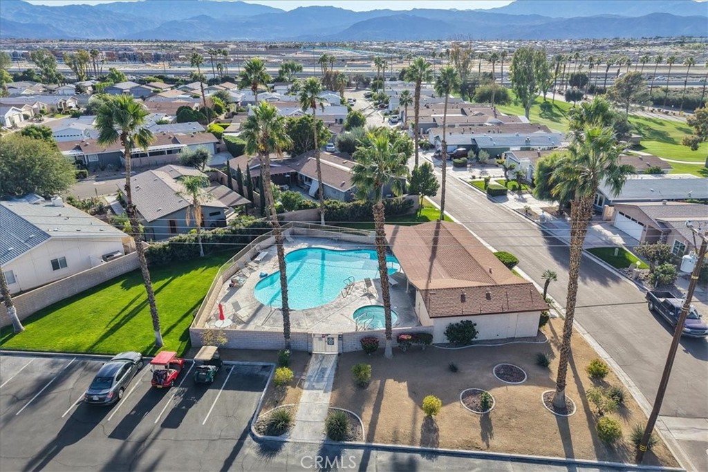 35493 Sand Rock Road Thousand Palms, CA 92276 - Photo 59 of 71 an aerial view of a house with a yard