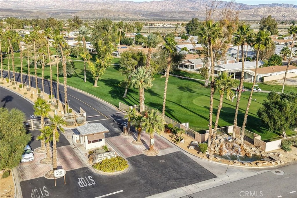 35493 Sand Rock Road Thousand Palms, CA 92276 - Photo 61 of 69 a view of a swimming pool with a patio