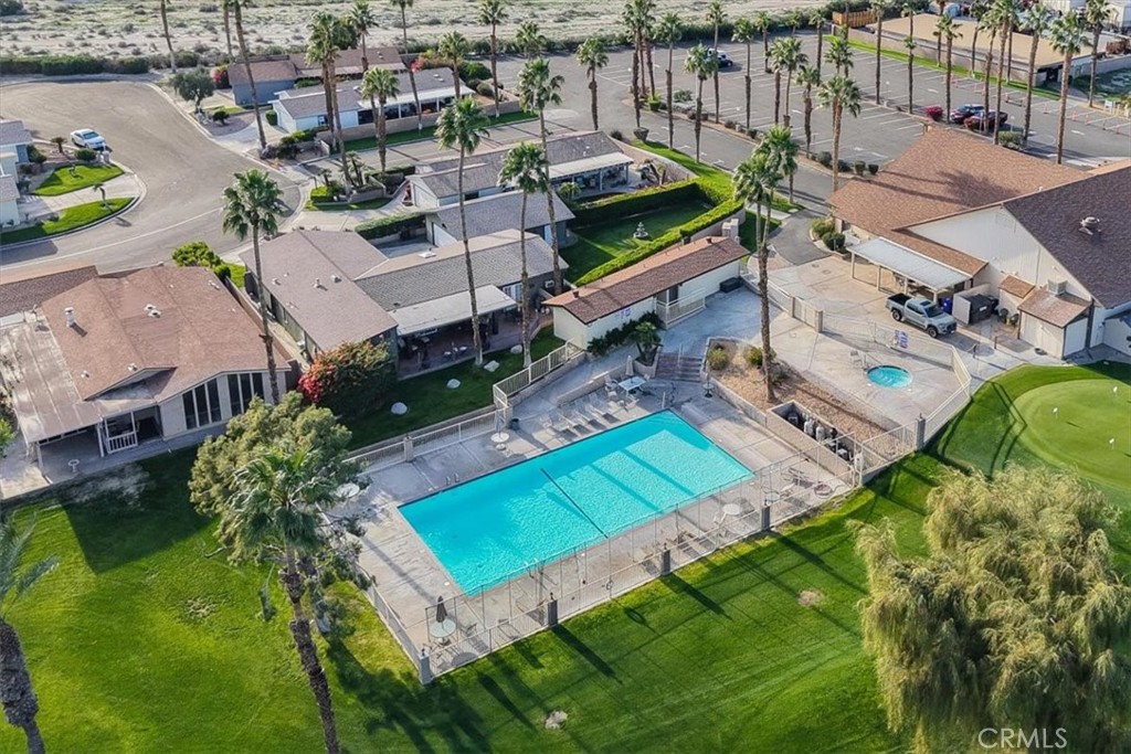 35493 Sand Rock Road Thousand Palms, CA 92276 - Photo 68 of 71 an aerial view of a house with a garden and swimming pool