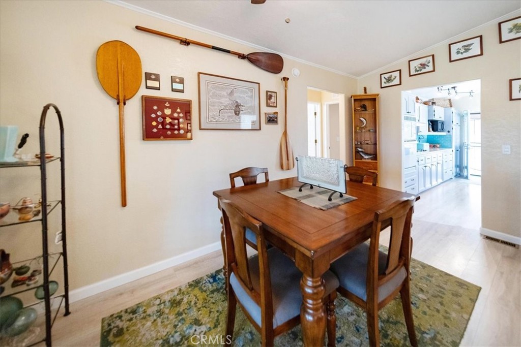 35493 Sand Rock Road Thousand Palms, CA 92276 - Photo 9 of 71 a view of a dining room with furniture