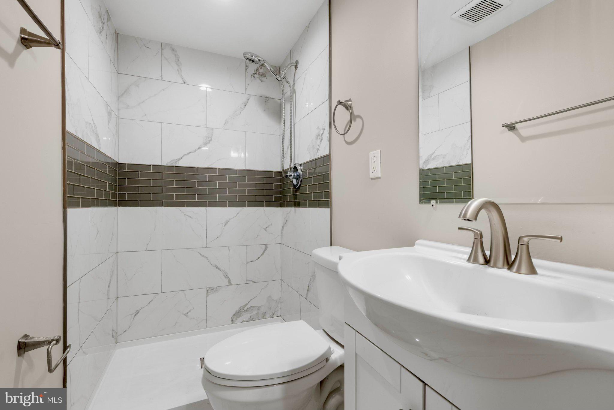145 North Monastery Avenue Baltimore, MD 21229 - Photo 27 of 45 Sleek modern bathroom retreat.