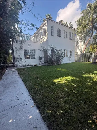 a view of a house with a big yard