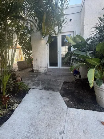 a view of a back yard of the house