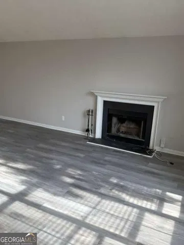a living room with a fireplace