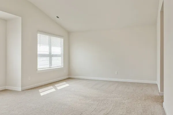 an empty room with a window