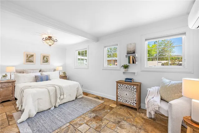 a bathroom with a toilet and a bathtub