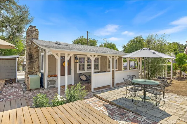 a backyard of a house with seating space