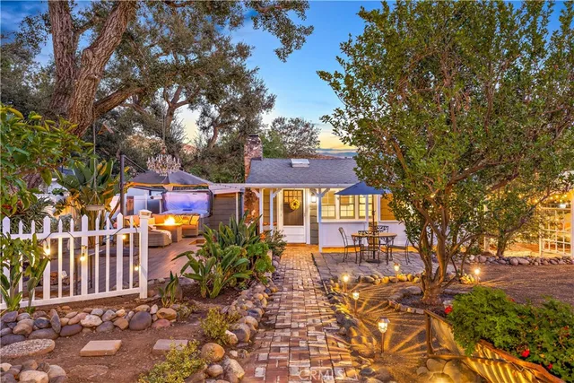 a view of a chairs and tables in the patio