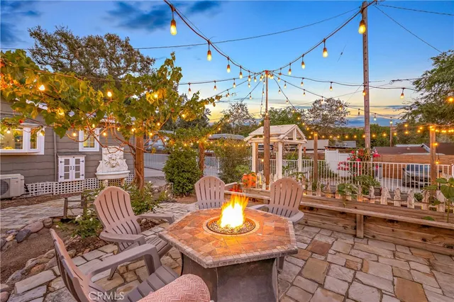 a backyard of a house with wooden floor