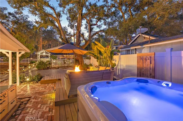 a view of a swimming pool with a yard