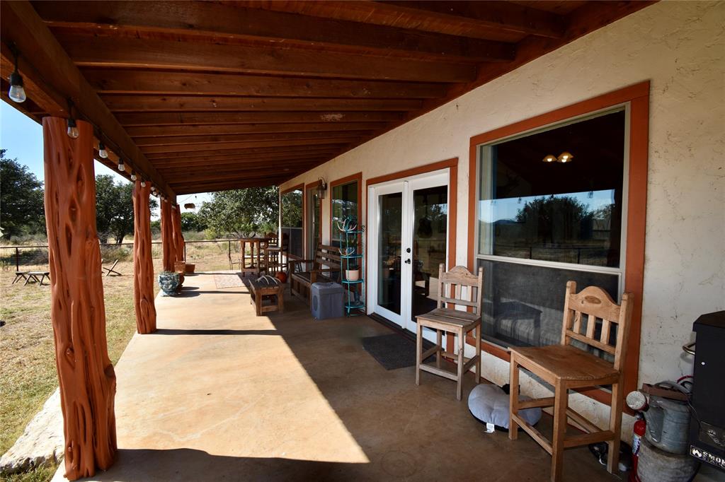 19319 Ranch Road 1871 Mason, TX 76856 - Photo 20 of 40 a view of a porch with furniture and a porch