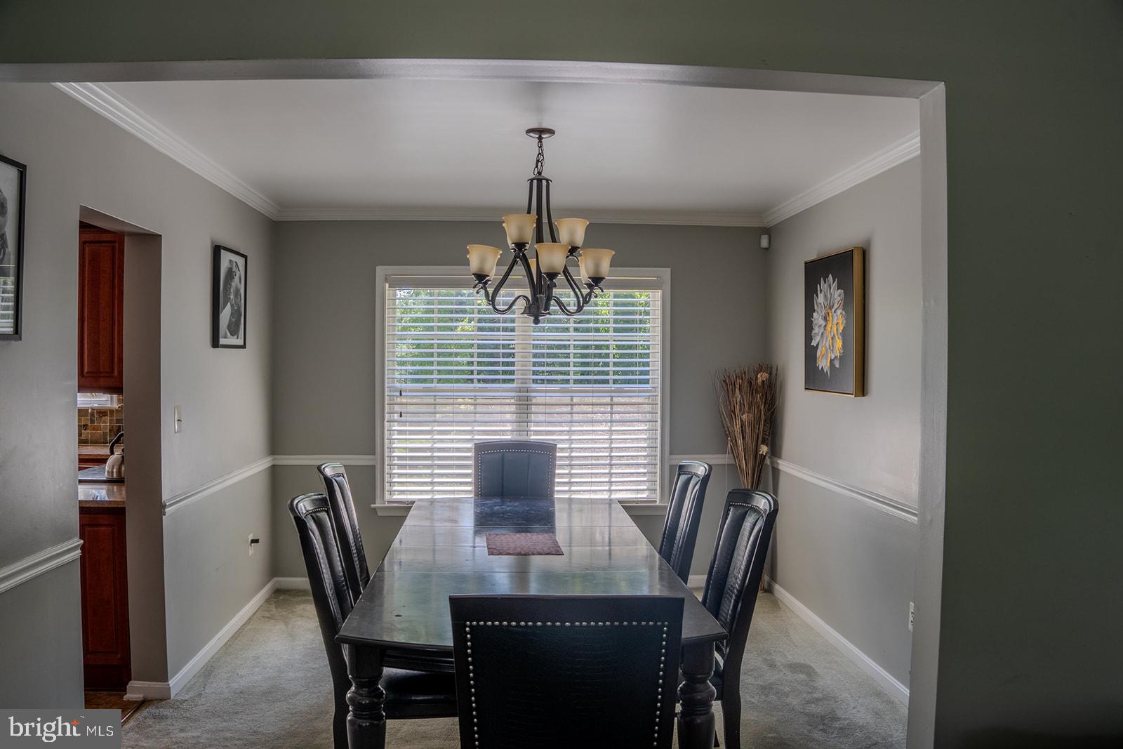 9737 Eustice Road Randallstown, MD 21133 - Photo 9 of 30 Elegant dining space with natural light.