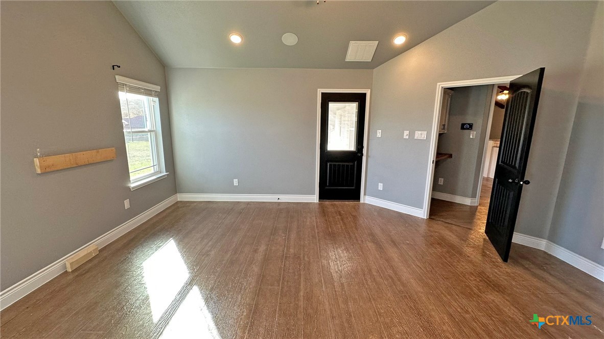 1142 Lutheran Church Road Copperas Cove, TX 76522 - Photo 34 of 48 an empty room with wooden floor and a window