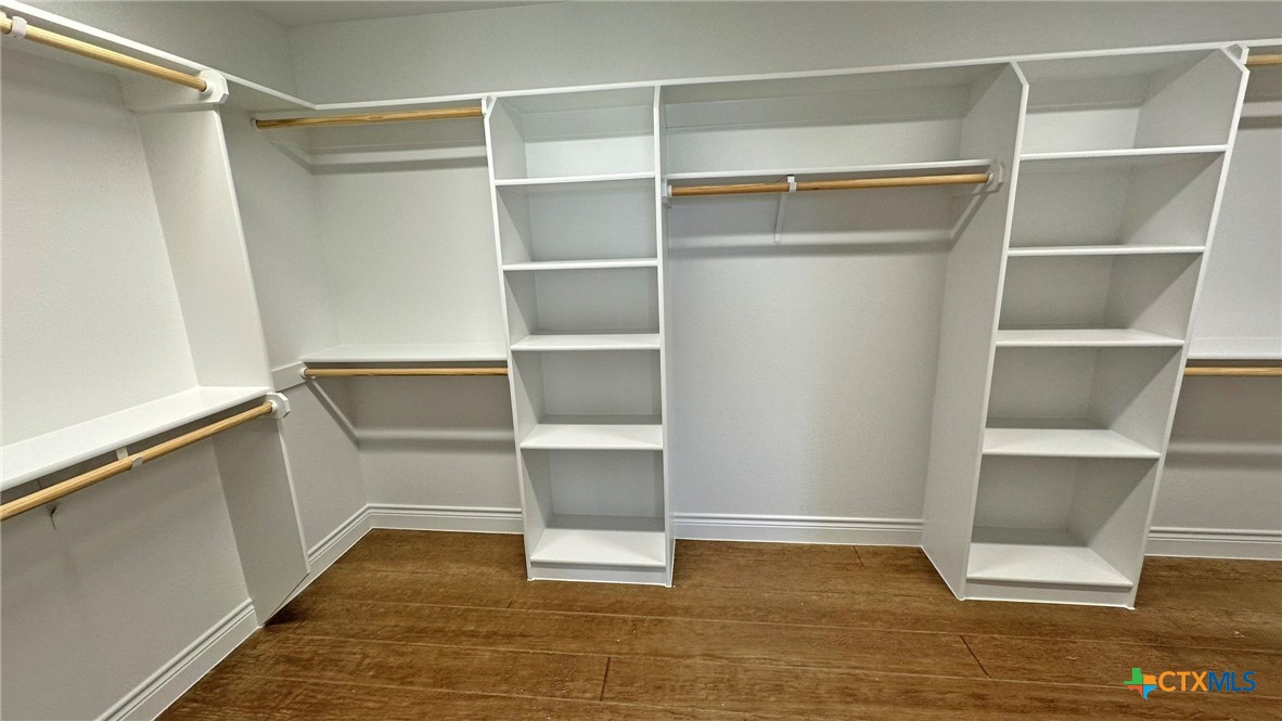 1142 Lutheran Church Road Copperas Cove, TX 76522 - Photo 37 of 48 a view of an empty walk in closet with empty racks