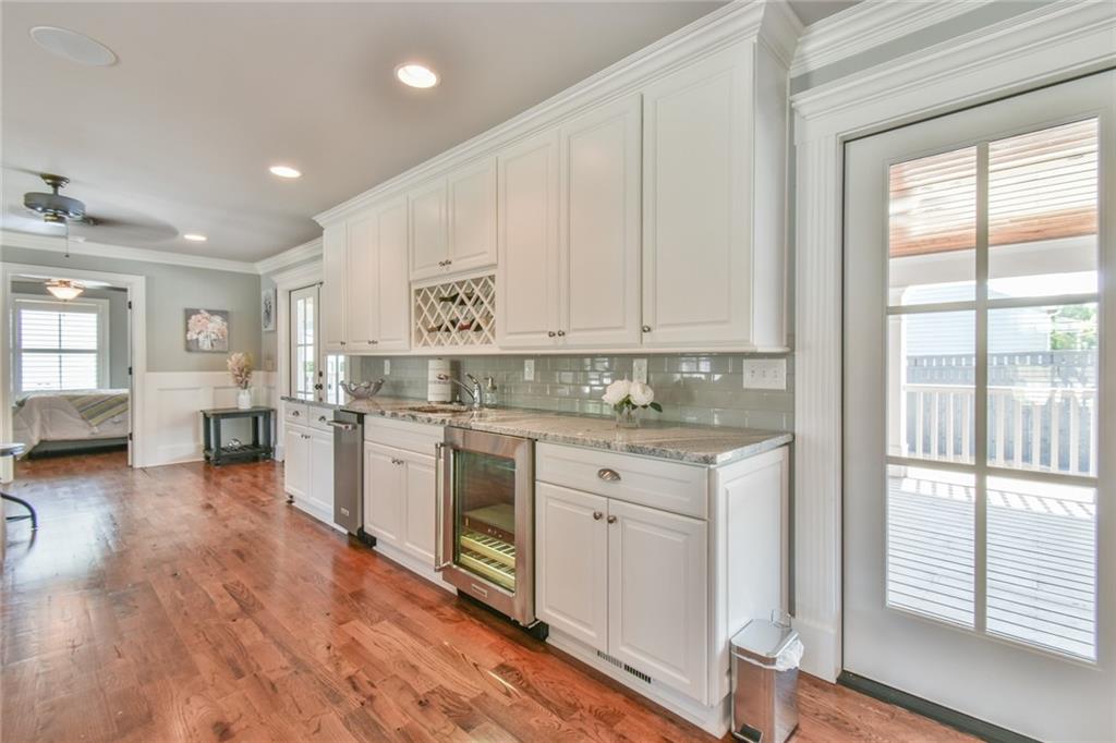 1060 A Bertram Road Augusta, GA 30909 - Photo 19 of 30 a kitchen with a stove sink and cabinets
