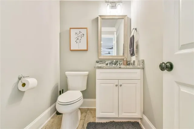 a view of a house with a backyard and a garden