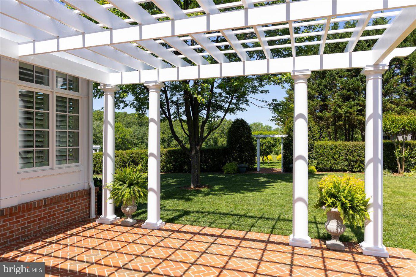 10042 Cedar Spring Lane Culpeper, VA 22701 - Photo 41 of 111 Brick patio off of the sun room