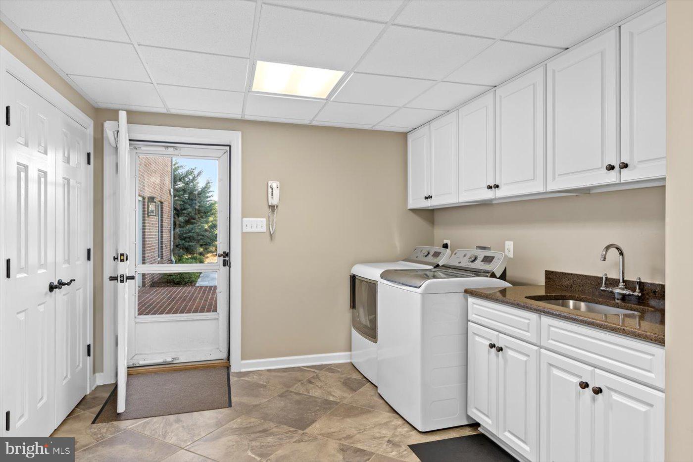 10042 Cedar Spring Lane Culpeper, VA 22701 - Photo 68 of 111 Here's said laundry area! Walk-out exit