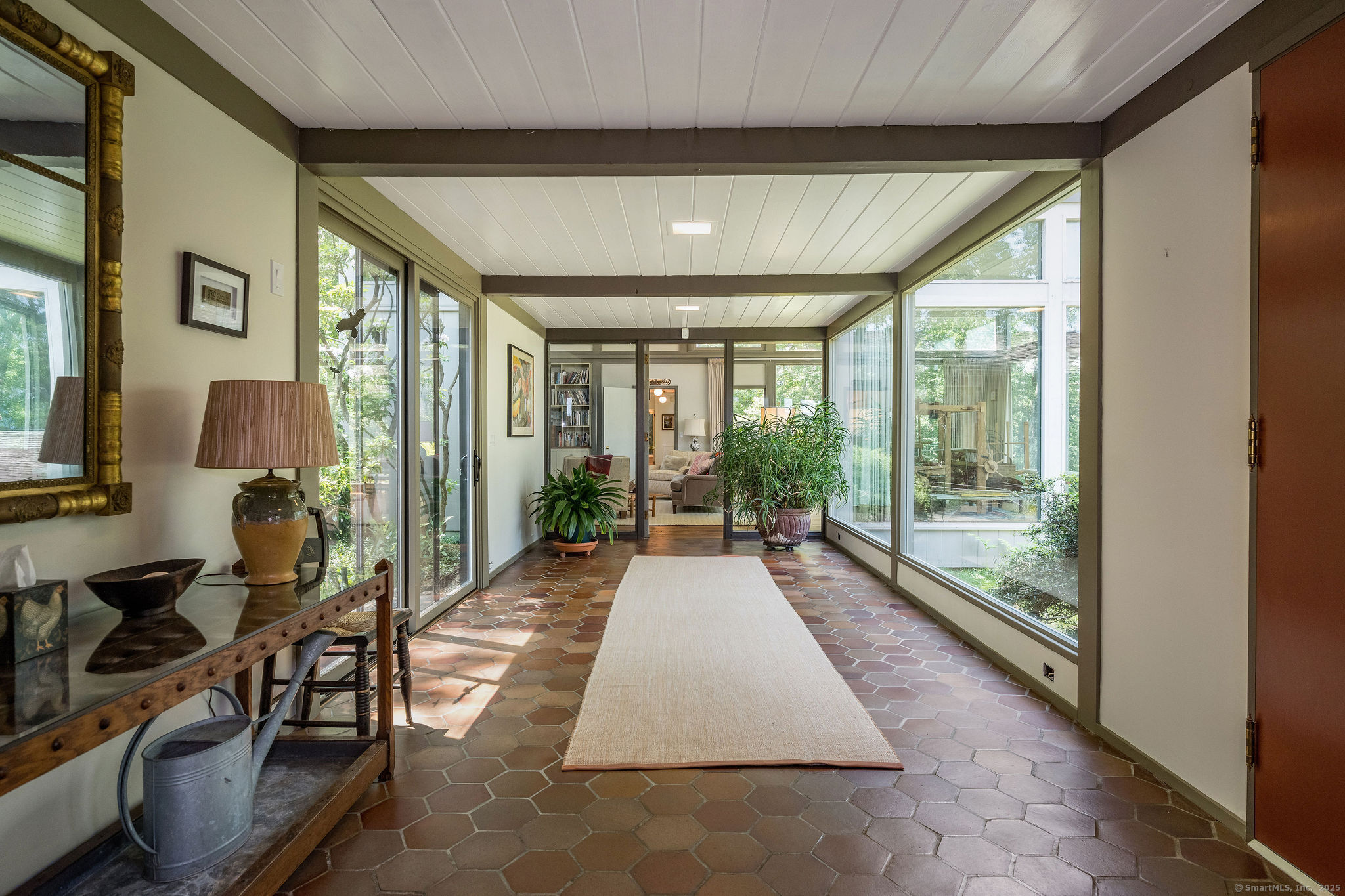 41 Watrous Point Road Old Saybrook, CT 06475 - Photo 12 of 40 a swimming pool with outdoor seating and yard