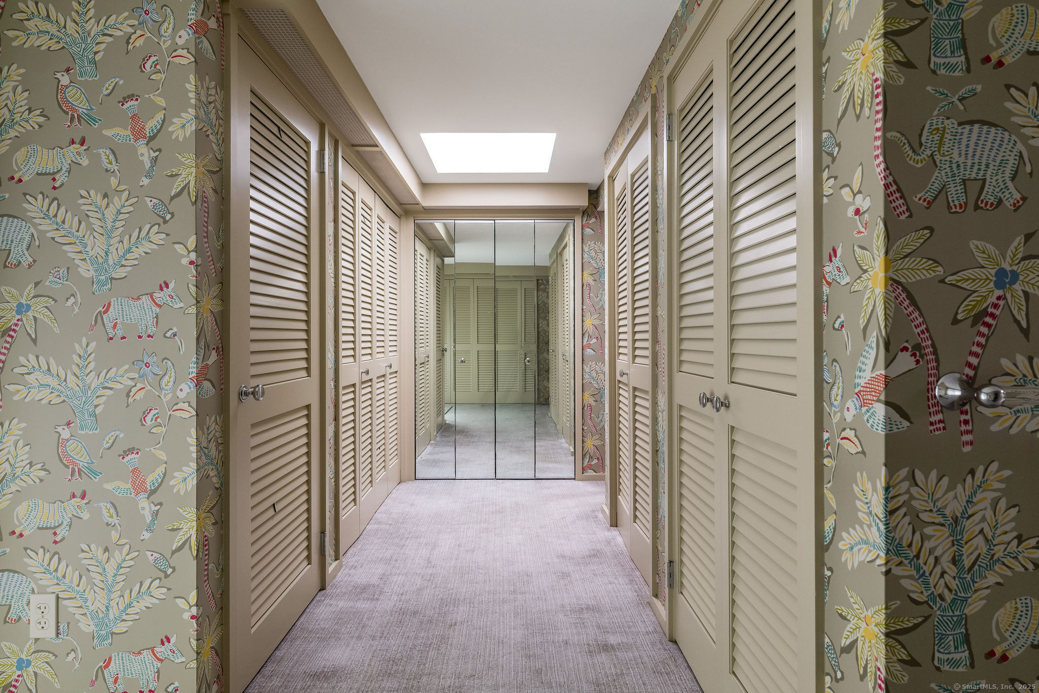 41 Watrous Point Road Old Saybrook, CT 06475 - Photo 30 of 40 a view of a hallway with wooden shelves