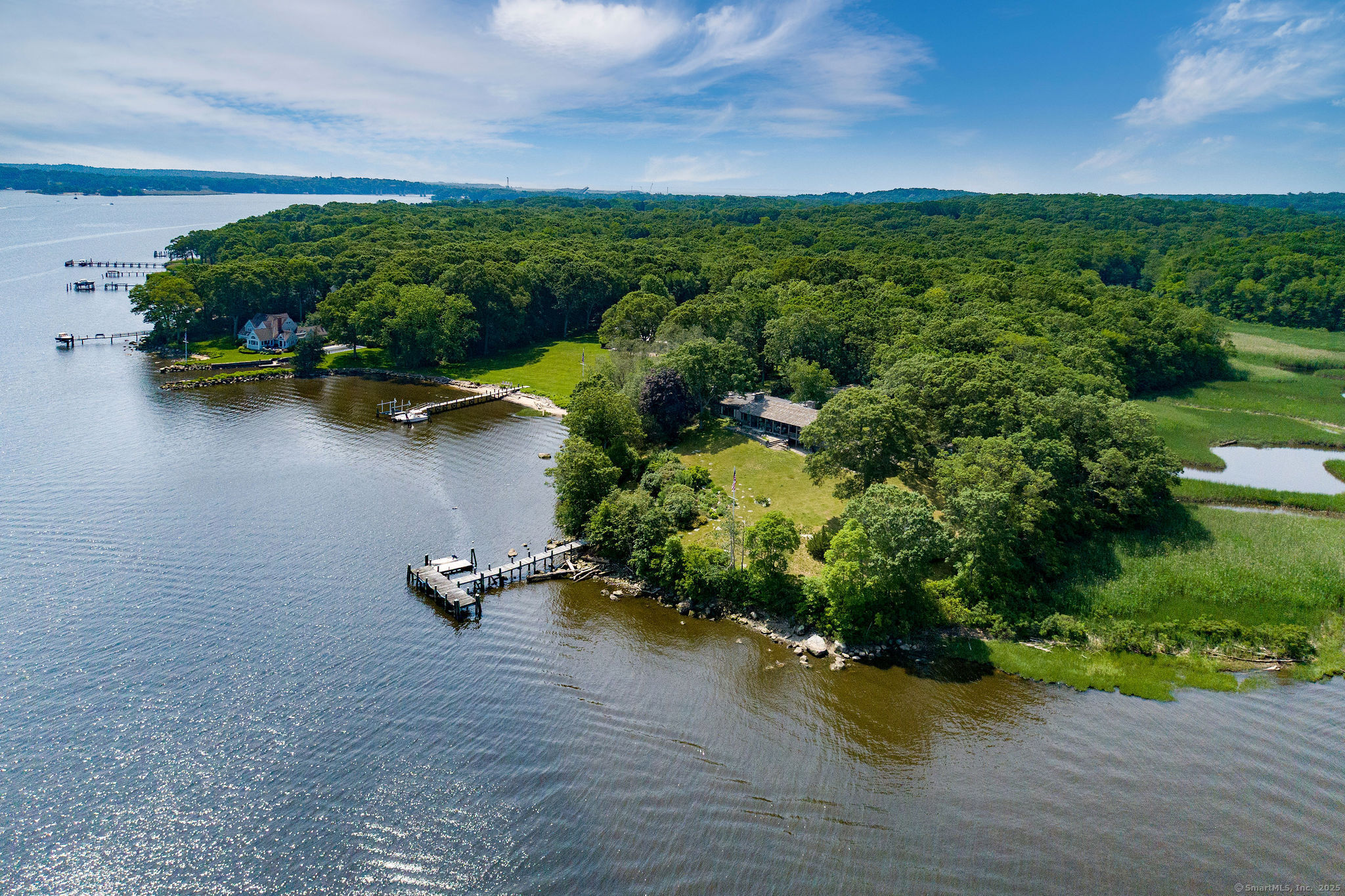 41 Watrous Point Road Old Saybrook, CT 06475 - Photo 4 of 40 an aerial view of water body with boats and trees all around