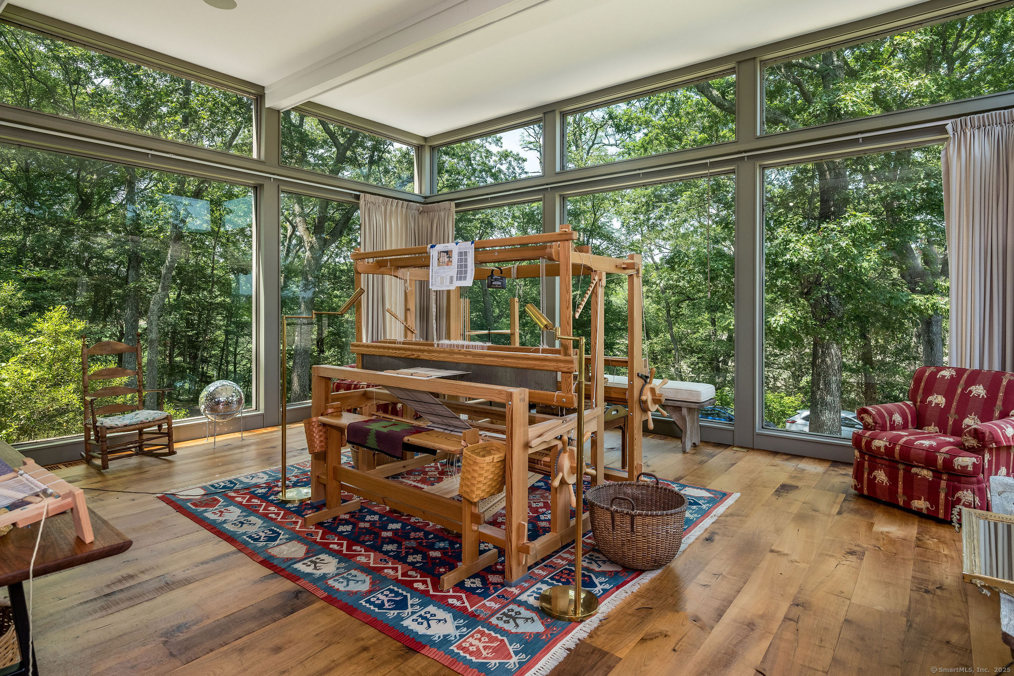 41 Watrous Point Road Old Saybrook, CT 06475 - Photo 9 of 40 a living room with furniture and a floor to ceiling window