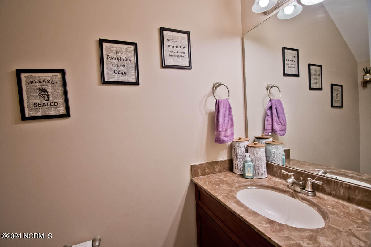 397 Inverness Drive Hubert, NC 28539 - Photo 15 of 50 Main level Half bath