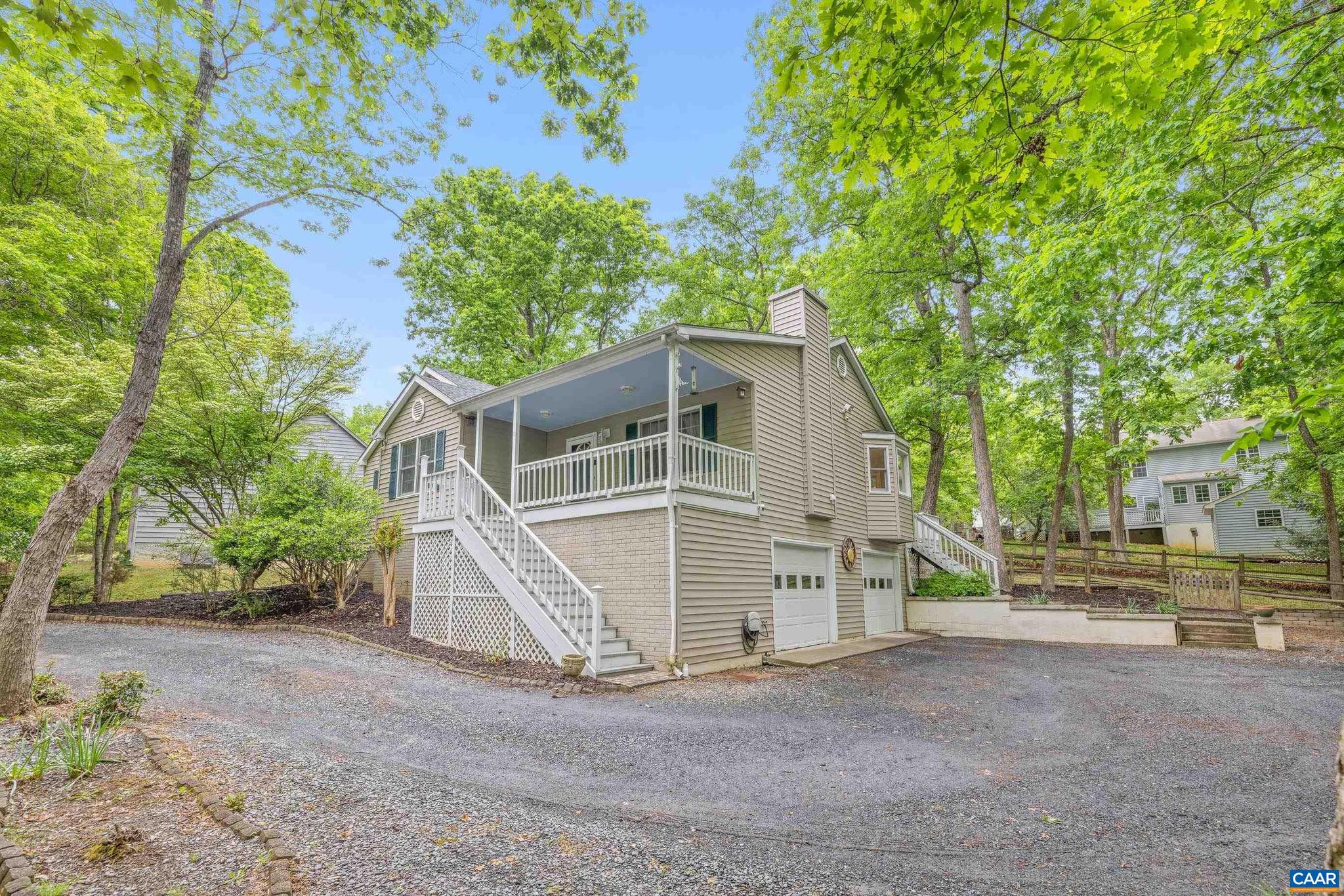 21 Ashton Road Palmyra, VA 22963 - Photo 2 of 35 a view of a house with a yard and garage