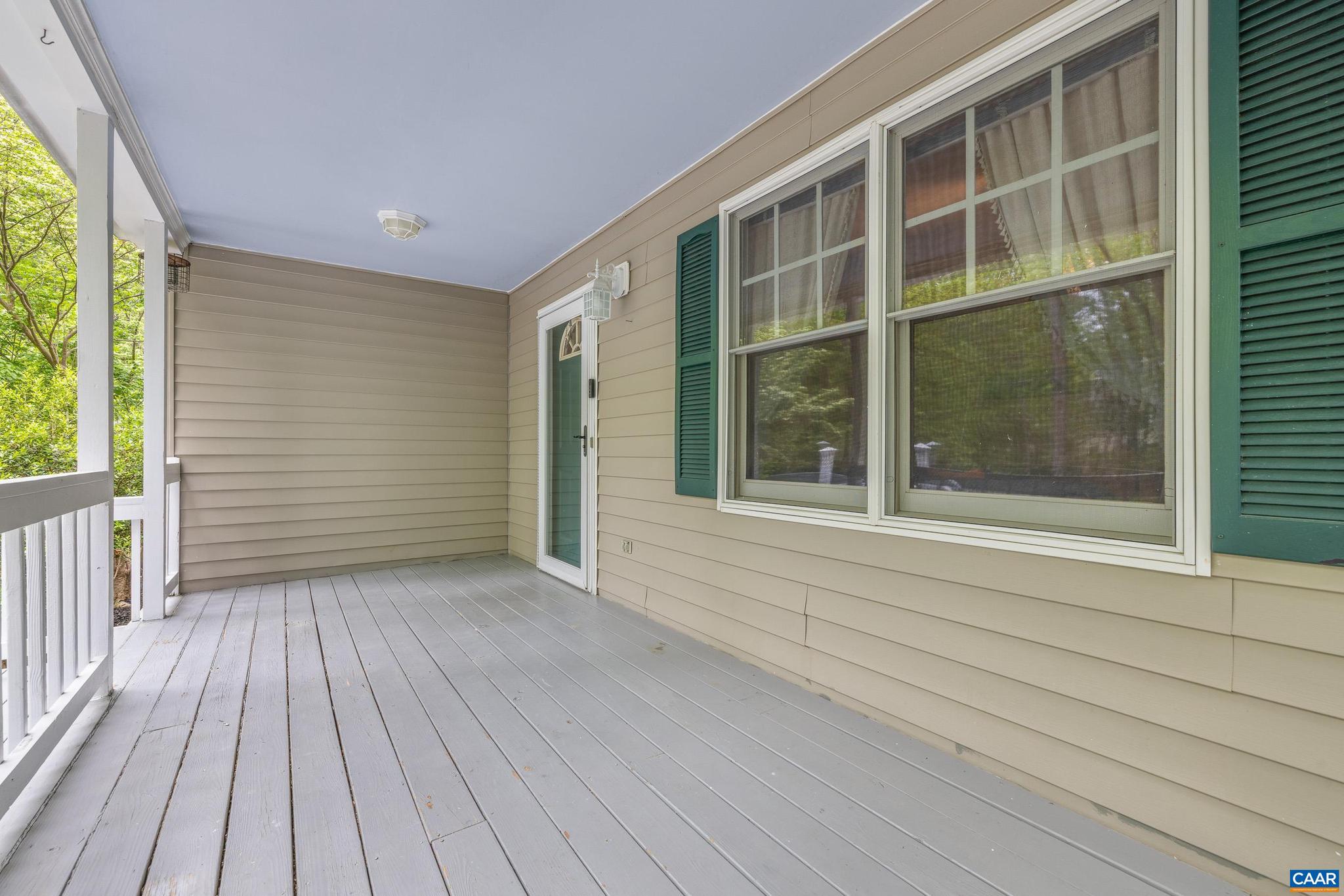 21 Ashton Road Palmyra, VA 22963 - Photo 4 of 35 a view of house with deck and floor to ceiling windows