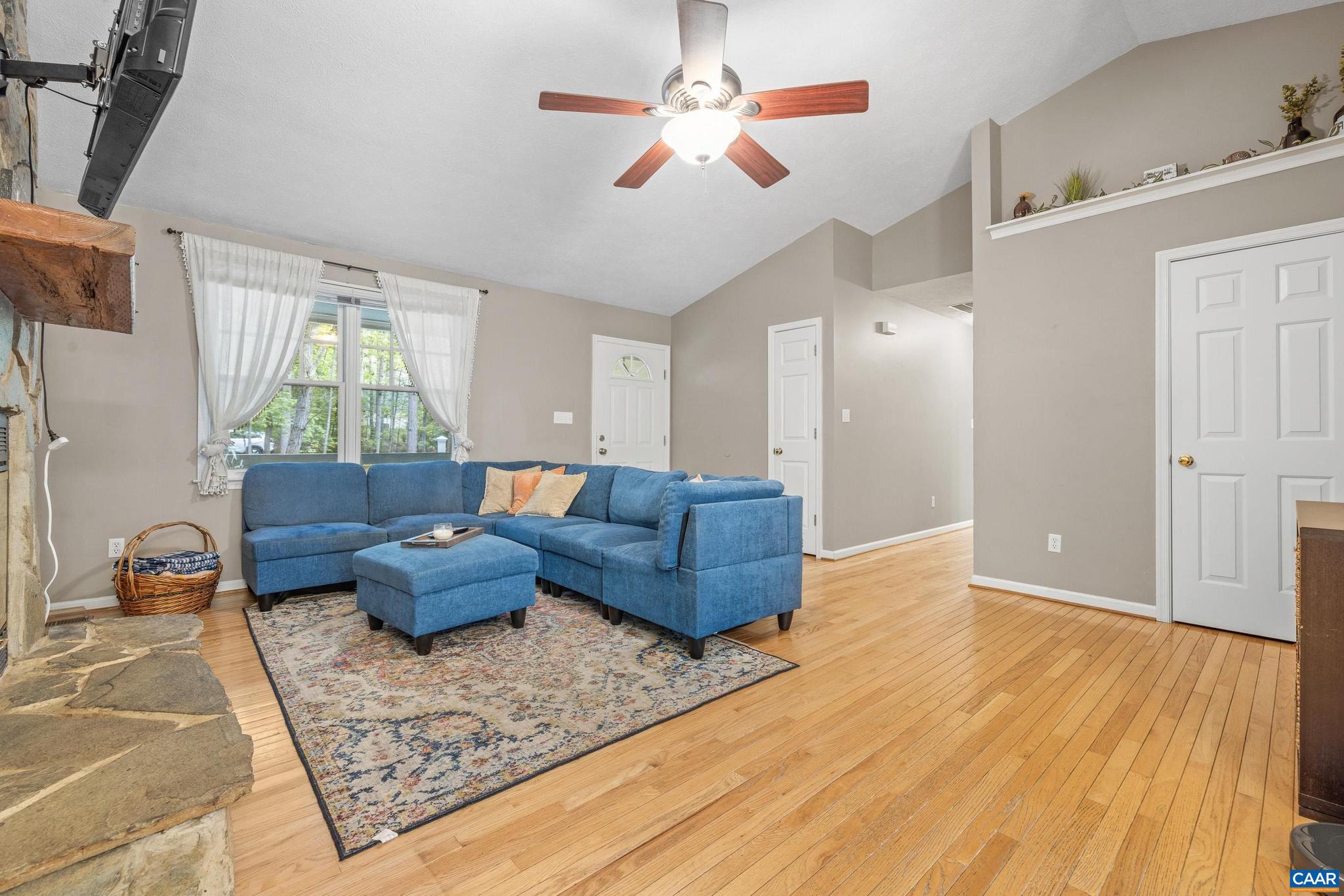 21 Ashton Road Palmyra, VA 22963 - Photo 9 of 35 a living room with furniture and a wooden floor