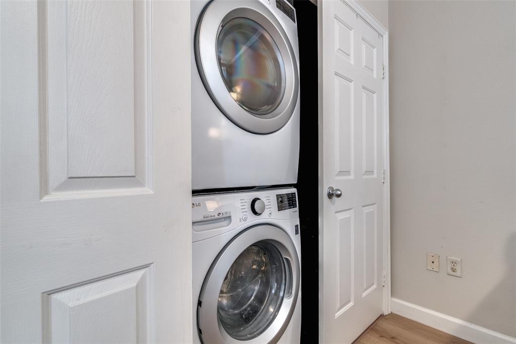 2305 Worthington Street, Unit 104 Dallas, TX 75204 - Photo 17 of 25 a utility room with dryer and washer