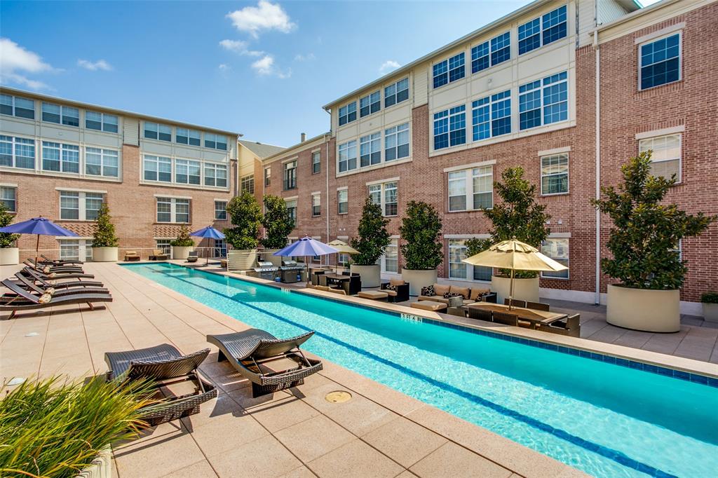 2305 Worthington Street, Unit 104 Dallas, TX 75204 - Photo 18 of 25 a view of a building and car parked