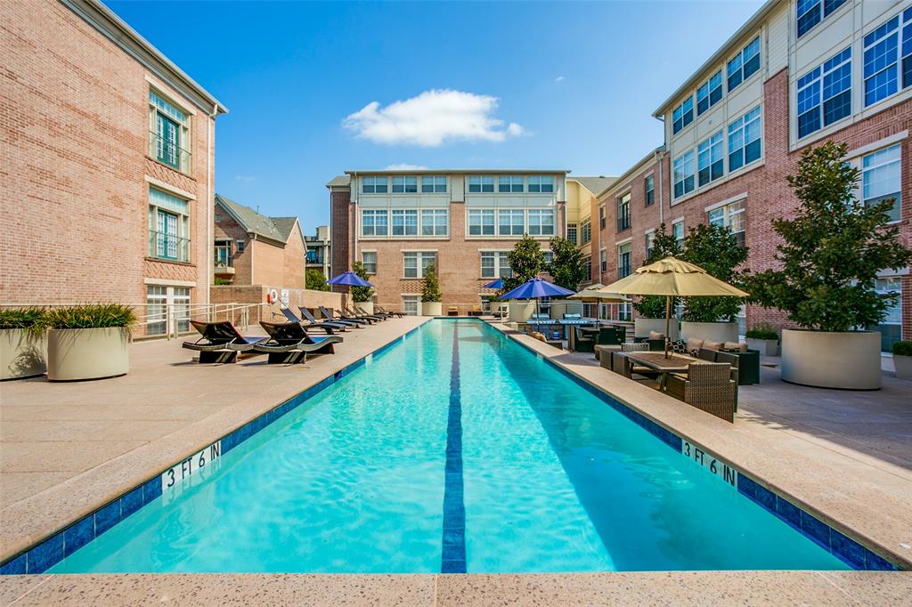 2305 Worthington Street, Unit 104 Dallas, TX 75204 - Photo 19 of 25 a view of a house with swimming pool