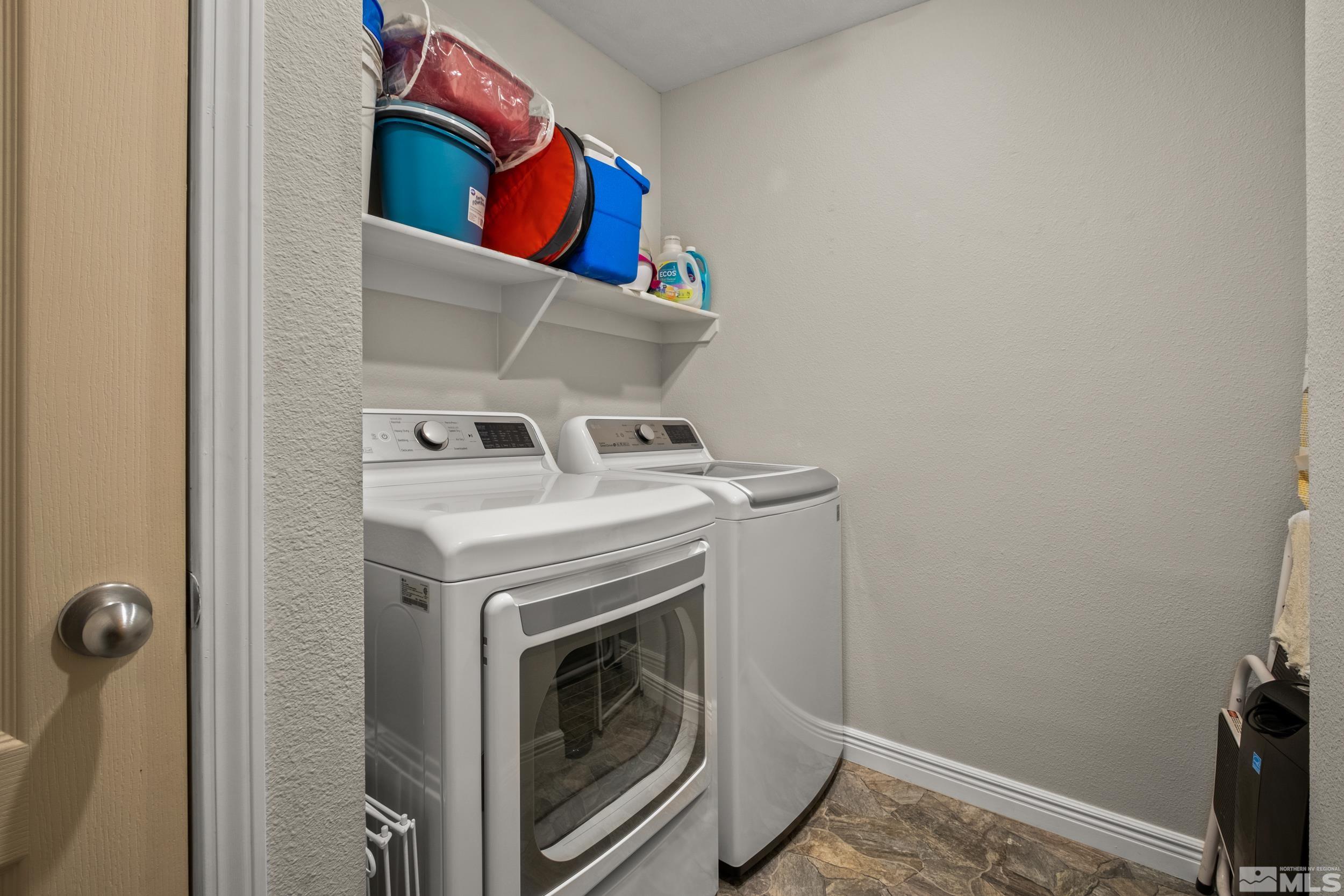 6850 Sharlands Avenue, Unit 1100 Reno, NV 89523 - Photo 12 of 26 a utility room with dryer and washer