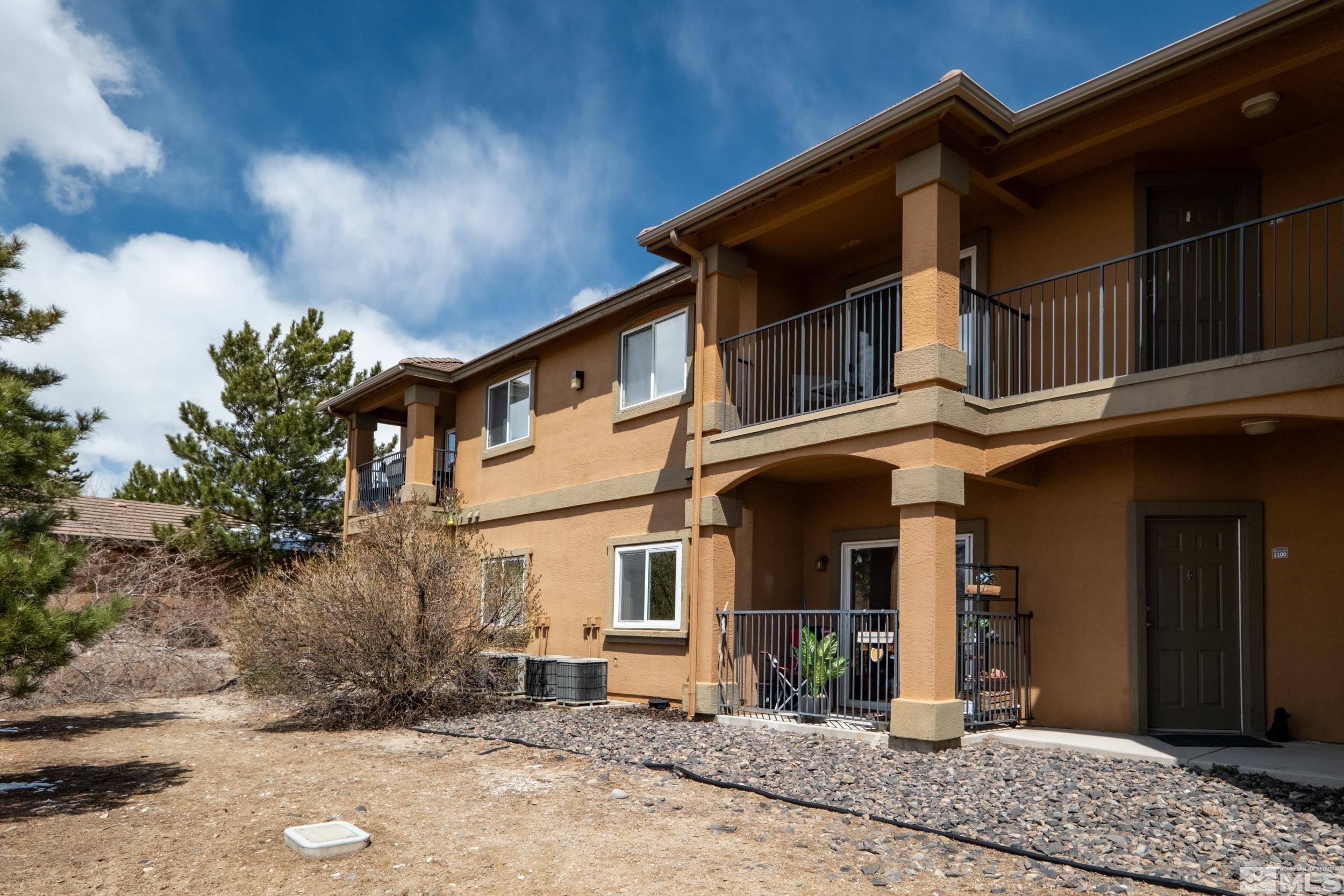 6850 Sharlands Avenue, Unit 1100 Reno, NV 89523 - Photo 2 of 26 a front view of a house