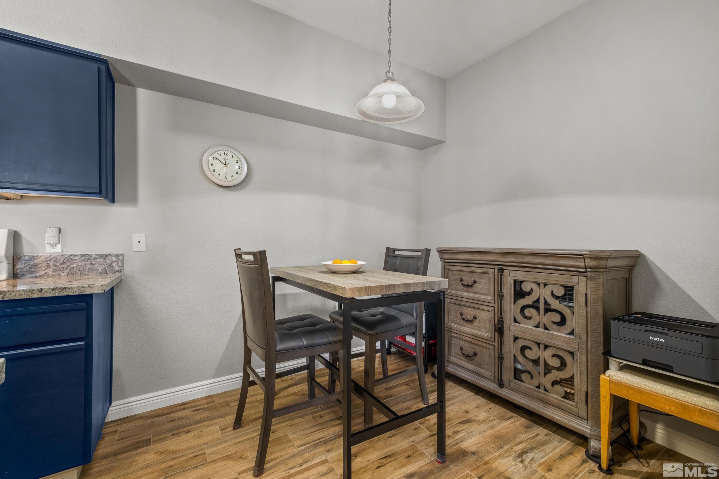 6850 Sharlands Avenue, Unit 1100 Reno, NV 89523 - Photo 8 of 26 a view of a dining room with furniture