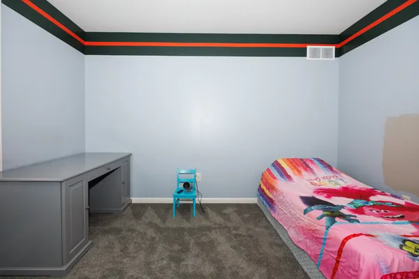 a room that has a bed in it