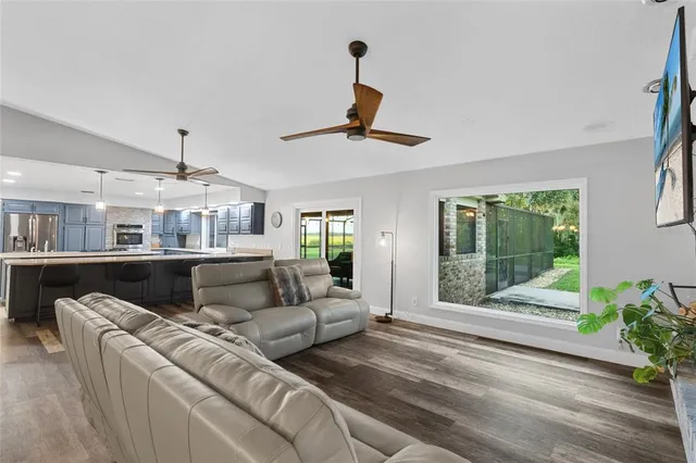 a living room with furniture and a window
