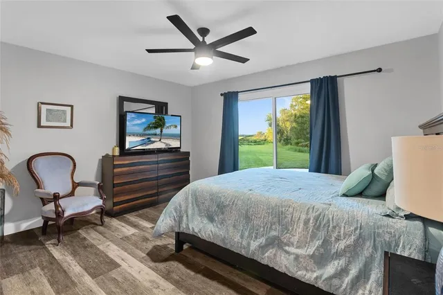 a bedroom with a bed and dresser