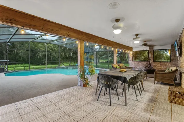 a patio with a table and chairs