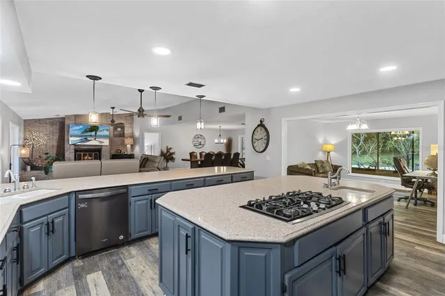 a kitchen with a stove and a sink