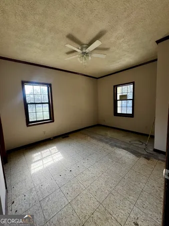 an empty room with windows