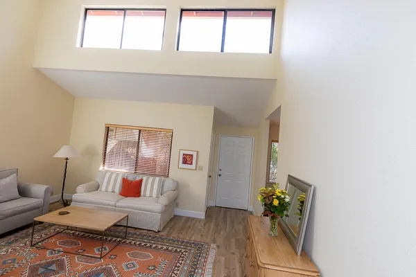 a living room with furniture and window